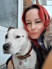 Portrait of woman with dog