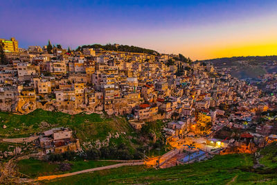 High angle view of townscape against sky at sunset