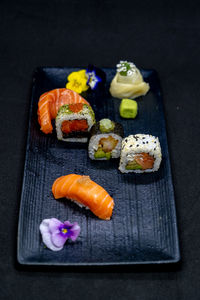 High angle view of sushi on cutting board