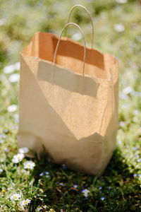 Close-up of gift box on field