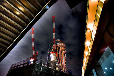 Low angle view of under construction building at night
