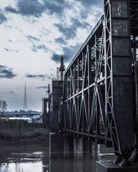 Bridge over river against sky