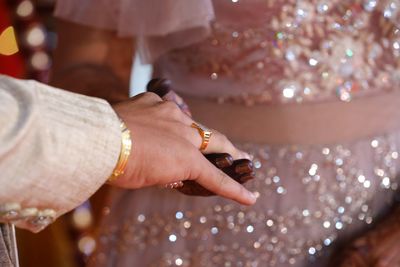 Close-up of woman holding hands