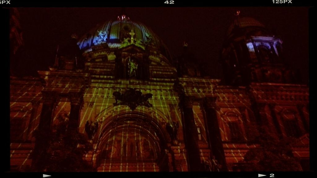 place of worship, religion, spirituality, church, architecture, built structure, building exterior, cathedral, arch, illuminated, night, low angle view, temple - building, history, famous place, travel destinations, ornate, entrance