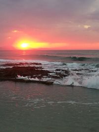 Scenic view of sea against sky during sunset