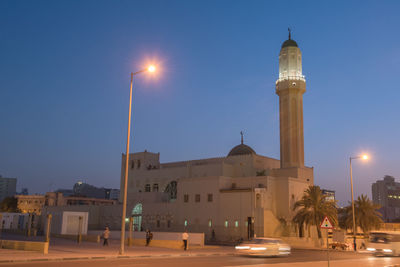 View of illuminated building against sky at night