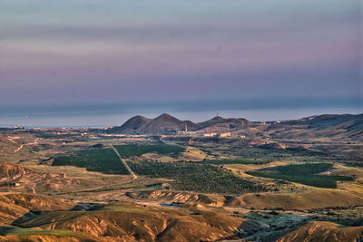 High angle view of landscape against sky during sunset