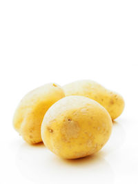 Close-up of fruits on white background