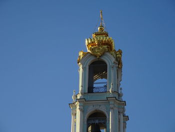 Low angle view of a building against clear blue sky