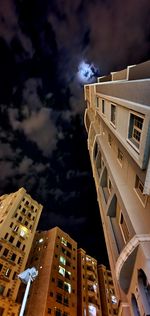 Low angle view of modern buildings against sky