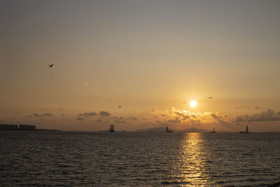 Scenic view of sea against sky during sunset