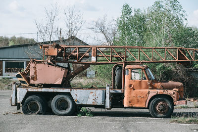 Abandoned vehicle on road