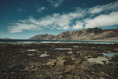 Scenic view of beach against sky