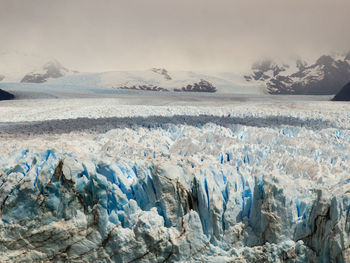 Aerial view of glacier against sky