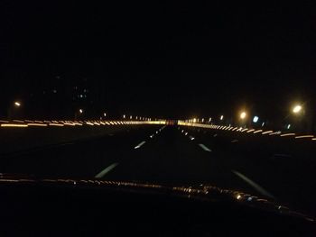 Illuminated street light at night