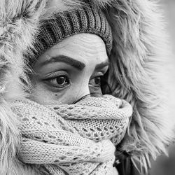 Close-up portrait of woman wearing hat