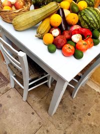 High angle view of various vegetables and fruits on table