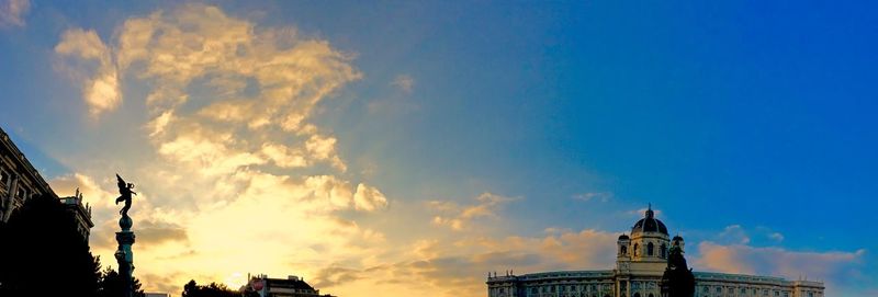 Kunsthistorisches museum against cloudy sky at sunset