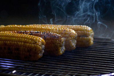 Close-up of meat on barbecue grill