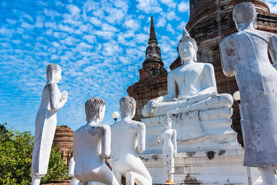 Statue of buildings against sky