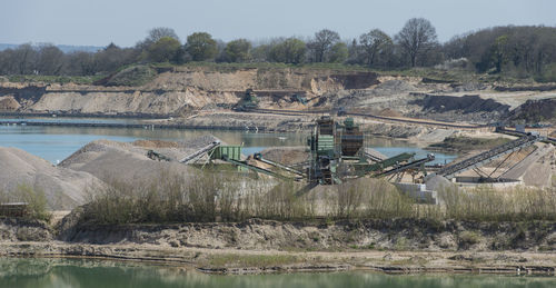 Gravel quarrying in a gravel pit during a drone flight