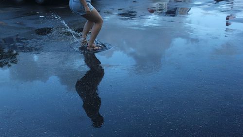 Reflection of people in water