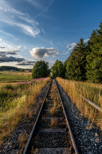 Railroad tracks against sky