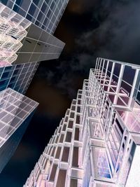 Low angle view of communications tower against sky