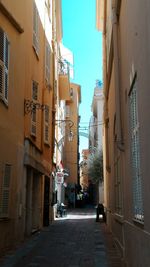 Narrow alley with buildings in background