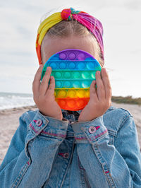 Happy child rainbow pop it toy having fun autumn sea trendy antistress sensory simple dimple fidget