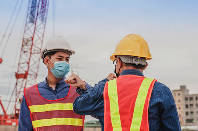 Man wearing hat at construction site