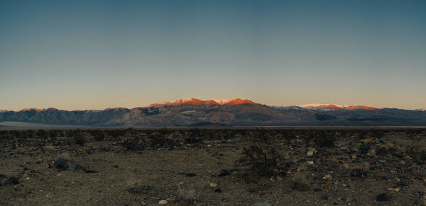 Scenic view of landscape against sky during sunset