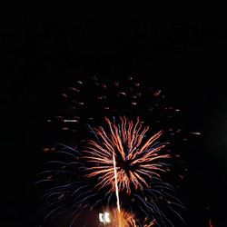 Low angle view of firework display