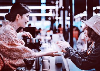 Woman drinking glass with coffee