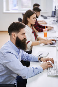 Business colleagues working at office