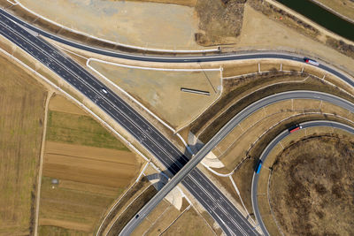 Aerial view of highway on land