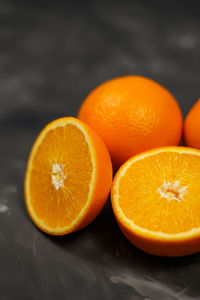 Close-up of orange slices on table