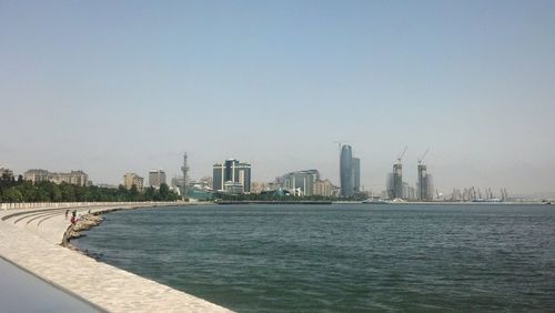 Scenic view of city against clear sky