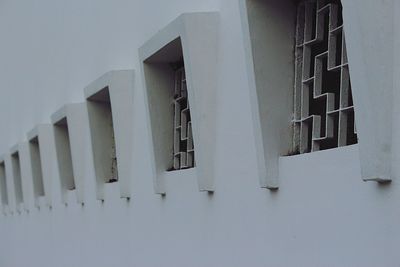 Low angle view of building against sky during winter