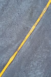 High angle view of yellow road marking