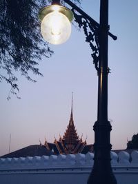 Low angle view of illuminated street light