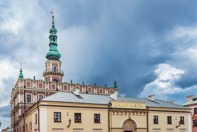 The city hall building with the town hall tower in the background. 