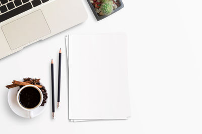 High angle view of coffee cup on table