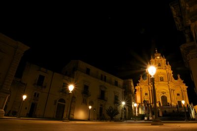 Illuminated street light at night