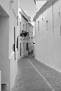 Narrow alley along buildings