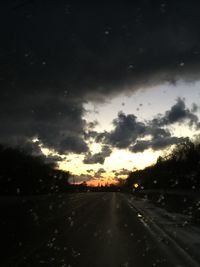 Road against sky at night