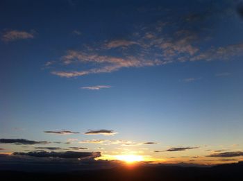 Low angle view of dramatic sky during sunset