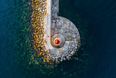 Spain, balearic islands, andratx, helicopter view of port d andratx lighthouse