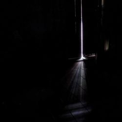 Empty illuminated corridor of building