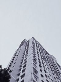 Low angle view of modern building against clear sky